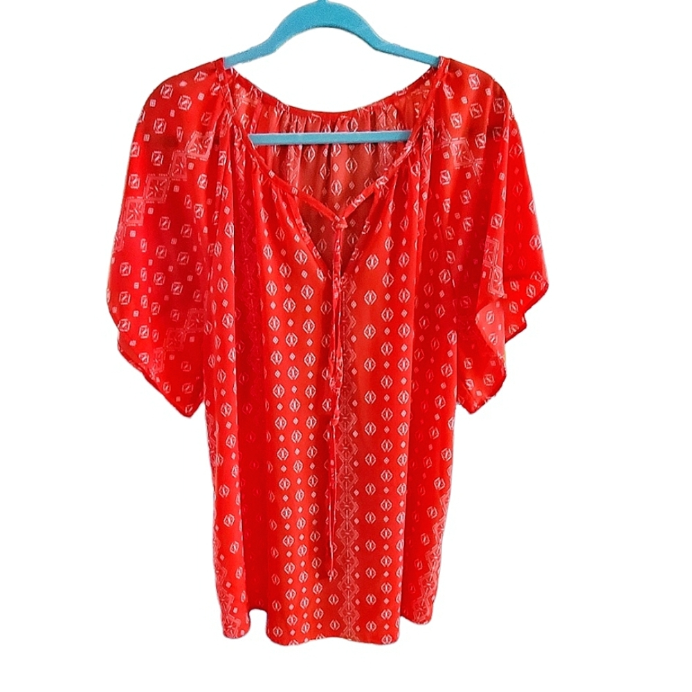 Pretty Orange and White short sleeve Blouse. No brand apparent. Size 2X.
